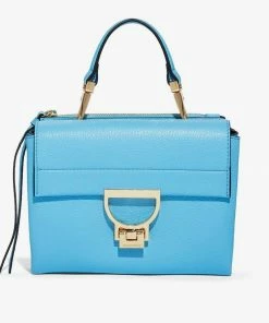 COCCINELLE Henkeltasche »Coccinelle Arlettis mini suede Handtasche blau«